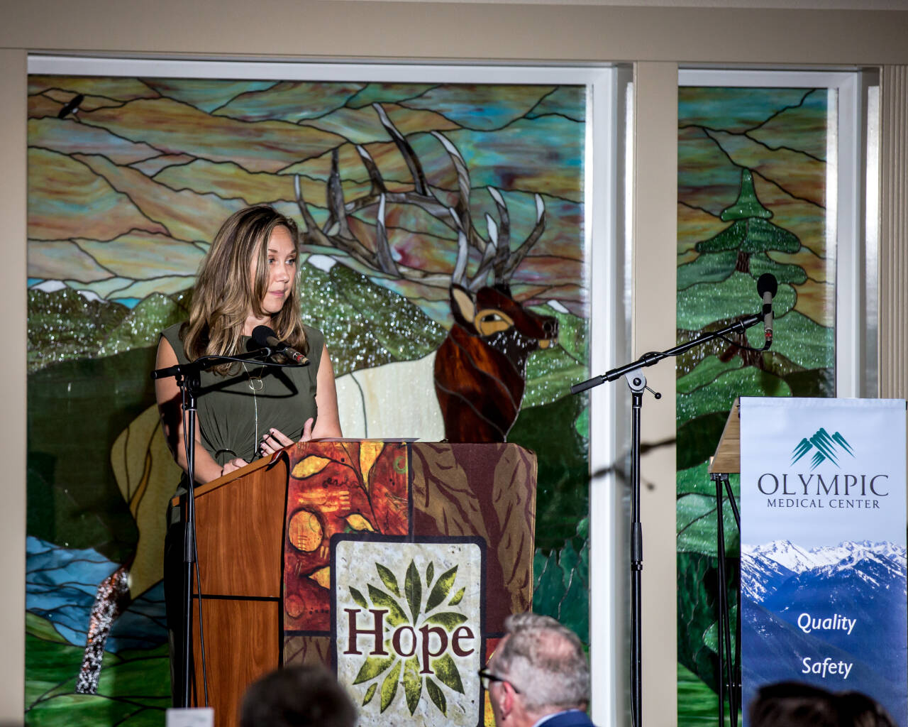 Carrie Wallin of the Fred Hutchinson Cancer Center talks about the institution’s long relationship with the OMC Cancer Center at the Harvest of Hope dinner in Sequim. (Photo courtesy of Olympic Medical Center Foundation)