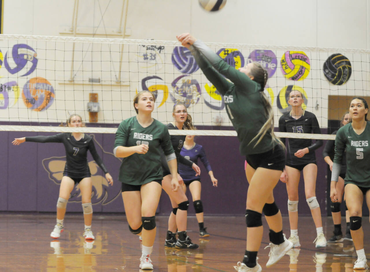 Port Angeles' Jayde Wold (1) digs the ball during a volleyball match against Sequim on Tuesday. In on the play are Roughriders Lily Halberg (12) and Karma Williams (5) and Sequim's Sydney Clark (7), Anna Cowan (8) and Kendall Hastings (15). Michael Dashiell/Olympic Peninsula News Group