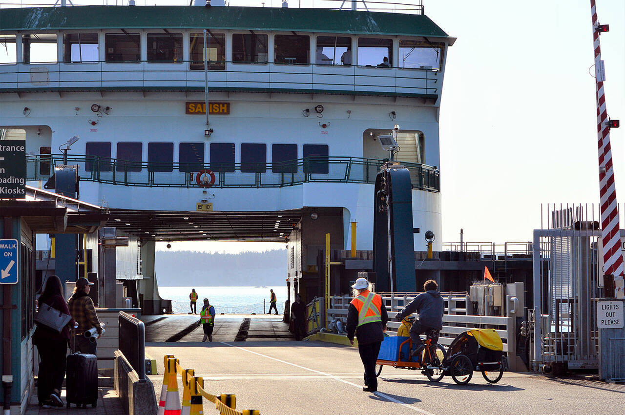 The M/V Salish, at the Port Townsend dock Thursday morning, is one of the 21 Washington State Ferries to have their names changed to celebrate the Seattle Mariners. The Salish, as long as the team stays in postseason play, will be renamed after Mariners pitcher Andres Muñoz. (Diane Urbani de la Paz/For Peninsula Daily News)