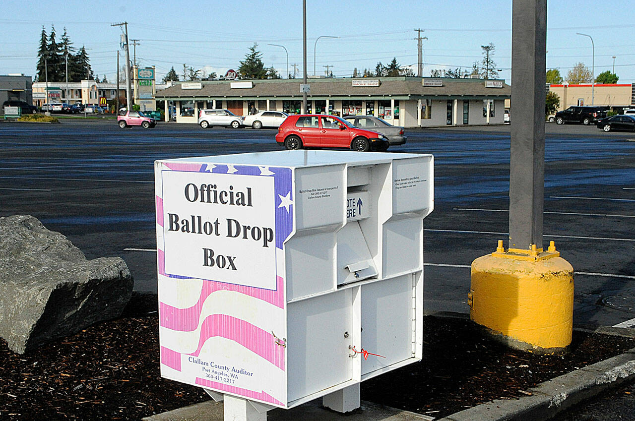 Sequim Police Department deputy chief Mike Hill reports that a nonpartisan group of ballot box observers at 651 W. Washington St. have not broken any laws and have obeyed state law despite some residents’ calls of concern about alleged harassment. “Harassment isn’t passive … and just sitting in a public place,” he said. (Matthew Nash/Olympic Peninsula News Group)