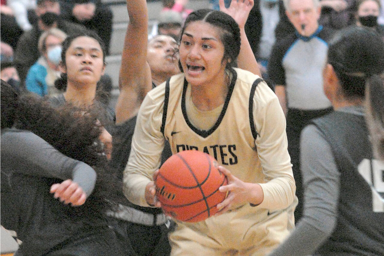 Keith Thorpe/Peninsula Daily News
Peninsula's Ituau Tuisaula finds herself surrounded by the Shoreline defense during Wednesday's game in Port Angeles.