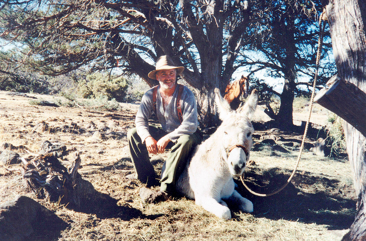 Bob “Bo” Neal was a cousin, father, grandfather, husband, logger, builder and a hunter who shared many adventures. He is pictured here with Milton the burro.