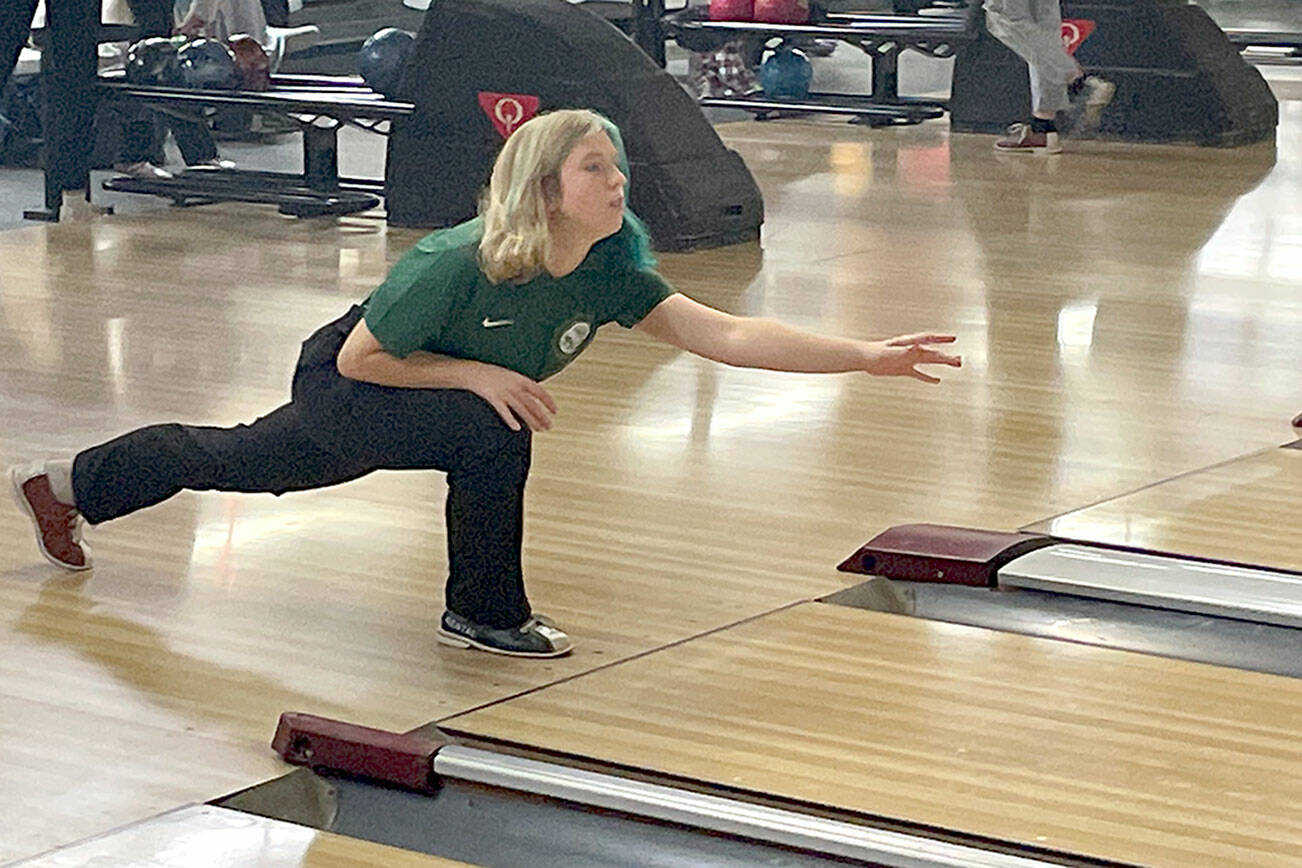 Port Angeles High School freshman Zoey Van Gordon is one of 12 players on the new girls bowling team that began competing this month under coach Becky Gunderson. Athletic director Dwayne Johnson said the school added bowling to its sports calendar to help improve girls’ athletic participation, which has been in decline. The team practices at Laurel Lanes. (Paula Hunt/Peninsula Daily News)