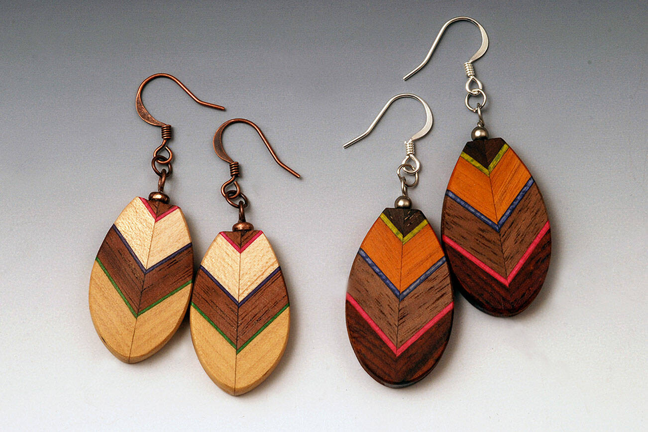 Martha Collins jewelry from wood is among pieces on view at Port Townsend Gallery.