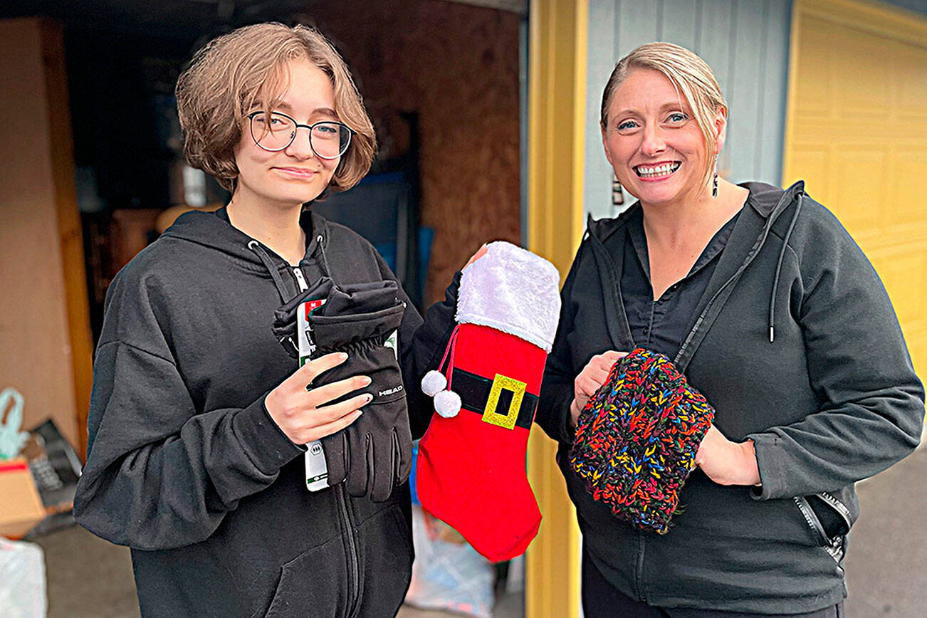 Matthew Nash/Olympic Peninsula News Group

For the second year, River Jensen, left, and her mom Anna Larsen plan to use stockings for River’s Christmas Project to supply toiletries to local homeless people and others in crisis. River, now 16, started the project seven years ago.