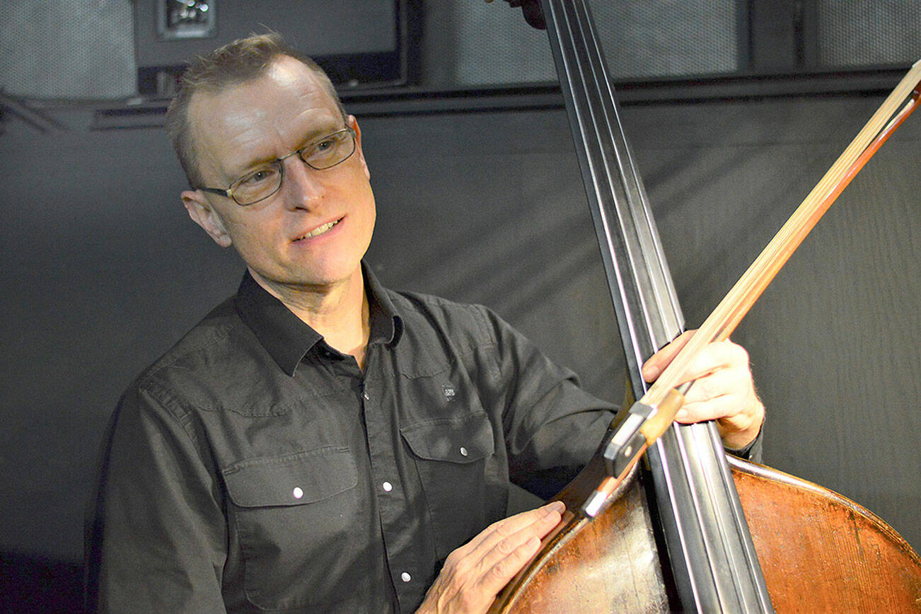 Steve Schermer, a Seattle musician and teacher originally from Port Angeles, will return home to perform with the Port Angeles Symphony Orchestra this Saturday. A specially commissioned concerto will make its world premiere during the performances. (Diane Urbani de la Paz)