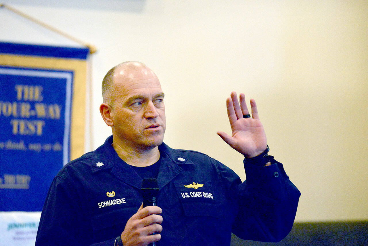 U.S. Coast Guard Cmdr. Brent Schmadeke, commanding officer of USCG Air Station Port Angeles, spoke to a meeting of the Port Angeles Noon Rotary on Wednesday about his command and what goes on out on Ediz Hook. (Peter Segall / Peninsula Daily News)