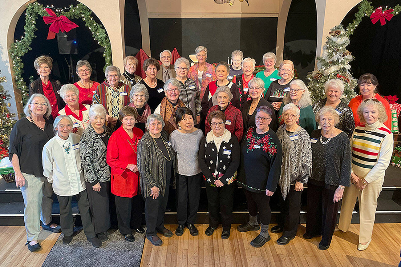 Matthew Nash/Olympic Peninsula News Group 
Volunteers with the Sequim Dungeness Hospital Guild gather for a photo during their volunteer appreciation luncheon in Olympic Theatre Arts. It was their first event honoring volunteers since 2017.