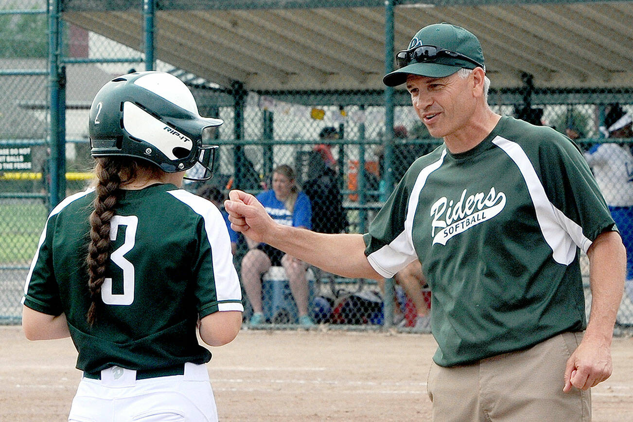 Lonnie Archibald/for Peninsula Daily News
Port Angeles softball coach Randy Steinman offers advice to a base runner during the 2018 state tournament. Steinman has resigned as head coach after a decade leading the program.