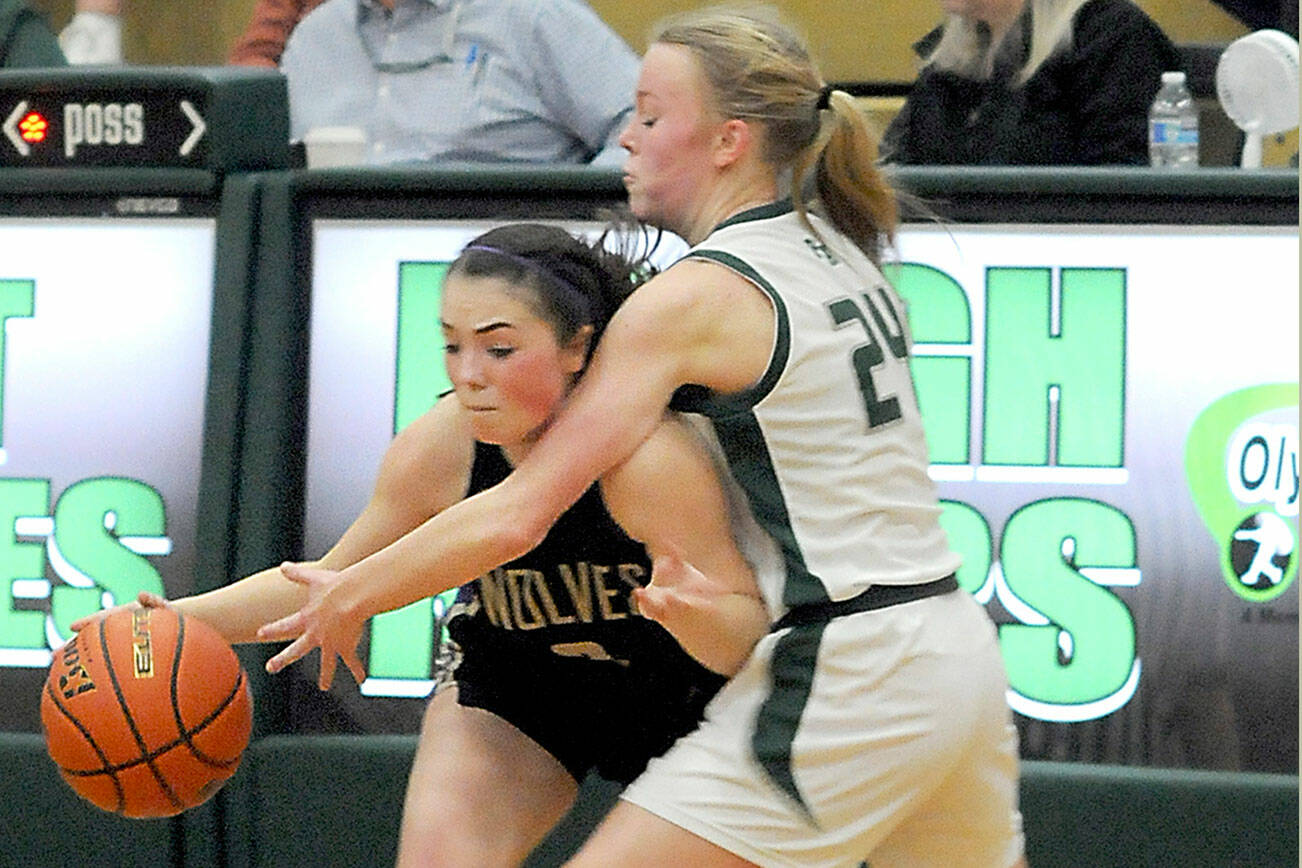 KEITH THORPE/PENINSULA DAILY NEWS
Sequim's Hannah Bates gets cut off by Port Angeles' Anna Petty during Tuesday's matchup in Port Angeles.