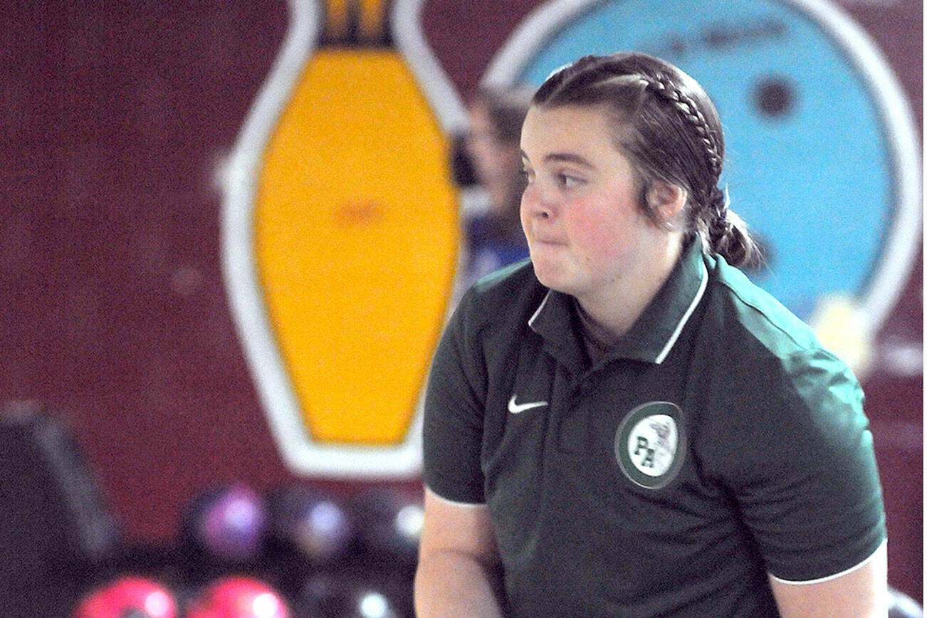 KEITH THORPE/PENINSULA DAILY NEWS
Port Angeles team captain Taylor Worthington prepares to take her turn on the lane during Thursday's four-way bowling tournament at Laurel Lanes in Port Angeles.