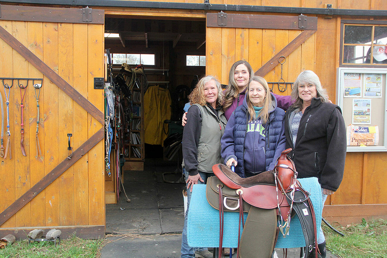 Photo by Karen Griffiths
As OPEN enters its 16th year, the local horse rescue organization is reaching out to the public to ask for more donations, because for the first time, the 2022-year end finances showed a deficient. Co-founder Diane Royall, left, with horse trainer (and her daughter) Kate Tibbits, board member Glenda Cable and Co-founder Valerie Jackson stand in front of OPEN’s used tack shop at 251 Roupe Road in Sequim. Open by appointment only, all proceeds go to help horses in. For an appointment or other inquiries call and leave a message, including your name and phone number, at 360-207-1688.