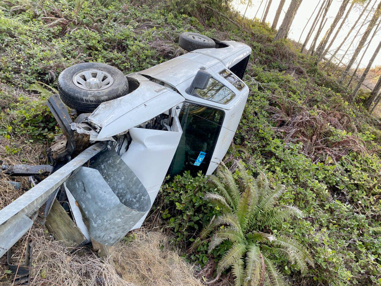 A 2009 Ford Ranger pickup hit ice and slid into a guardrail and into a ditch on state Highway 104 on Thursday.