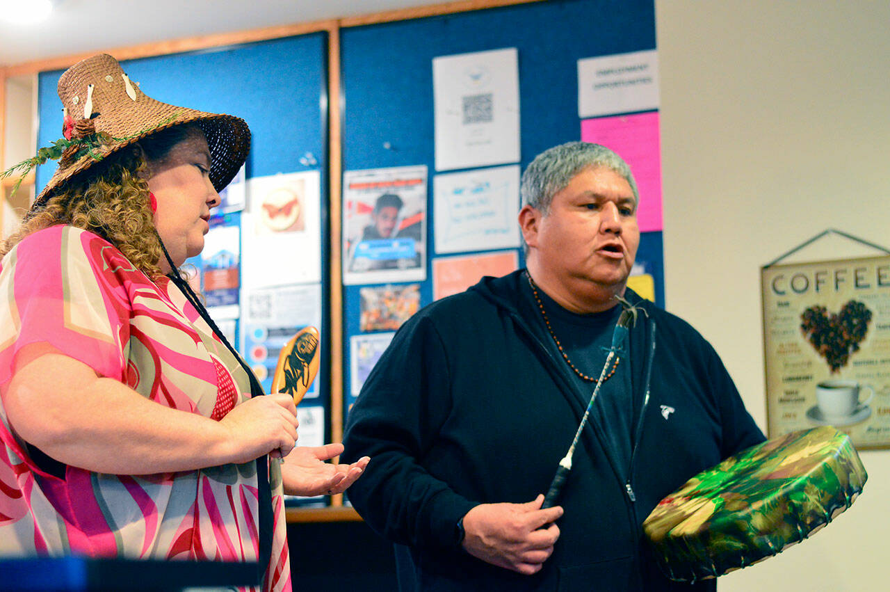 Laura and Joseph Price of the Port Gamble S’Klallam tribe sang a song honoring the Nest, a new youth coffee house at 1119 Lawrence St. in Port Townsend, on Friday afternoon. The nonprofit organization OWL360 has opened the hangout, where coffee and other soft drinks flow. (Diane Urbani de la Paz/For Peninsula Daily News)