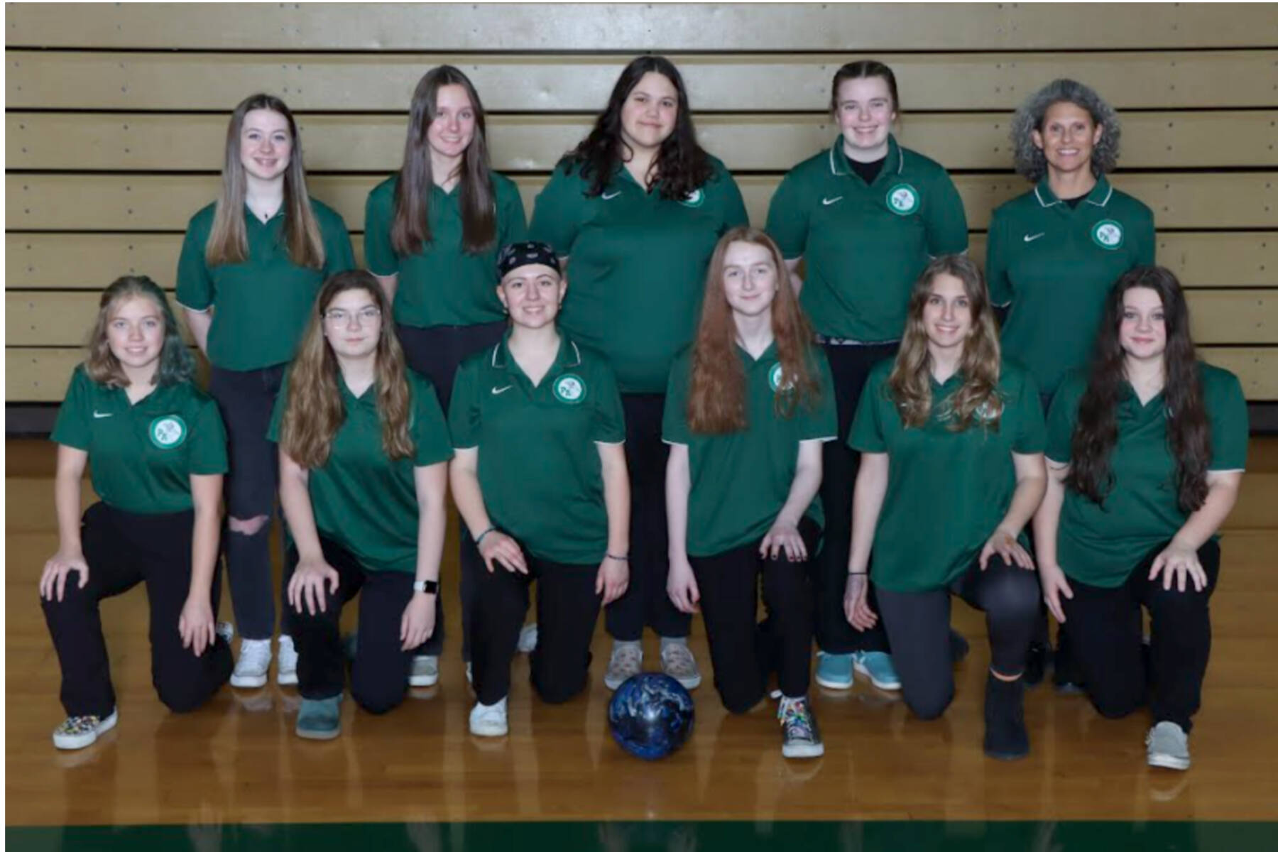 The Port Angeles girls bowling team. From left, front, are Zoey Van Gordon, Izzy Spencer, Violet Mills, Kenadie Ring, Paige Pangaro and Abby Rudd. From left, rear, are Lily Thomas, Natalie Robinson, Abby Robinson, Taylor Worthington and Coach Rebecca Gundersen. Not pictured is Sophie Constant.