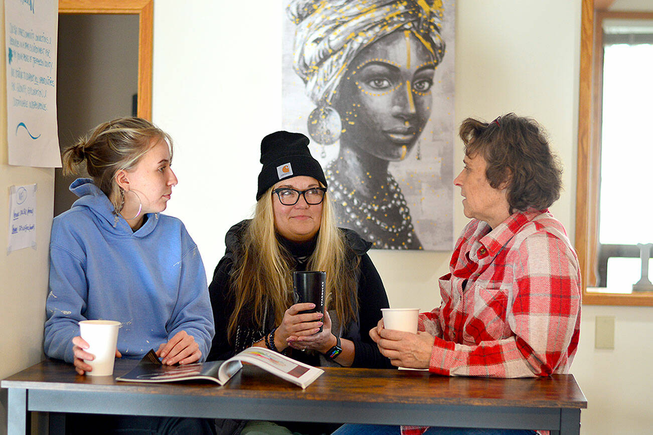 At the Nest in Uptown Port Townsend on Wednesday are, from left, lead coffee companion Karley Caseber, program manager Dana Marklund and OWL 360 Executive Director Kelli Parcher. (Diane Urbani de la Paz/For Peninsula Daily News)
