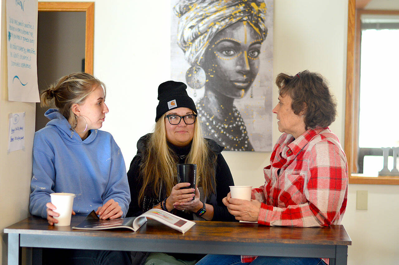 At the Nest in Uptown Port Townsend on Wednesday are, from left, lead coffee companion Karley Caseber, program manager Dana Marklund and OWL 360 Executive Director Kelli Parcher. (Diane Urbani de la Paz/For Peninsula Daily News)