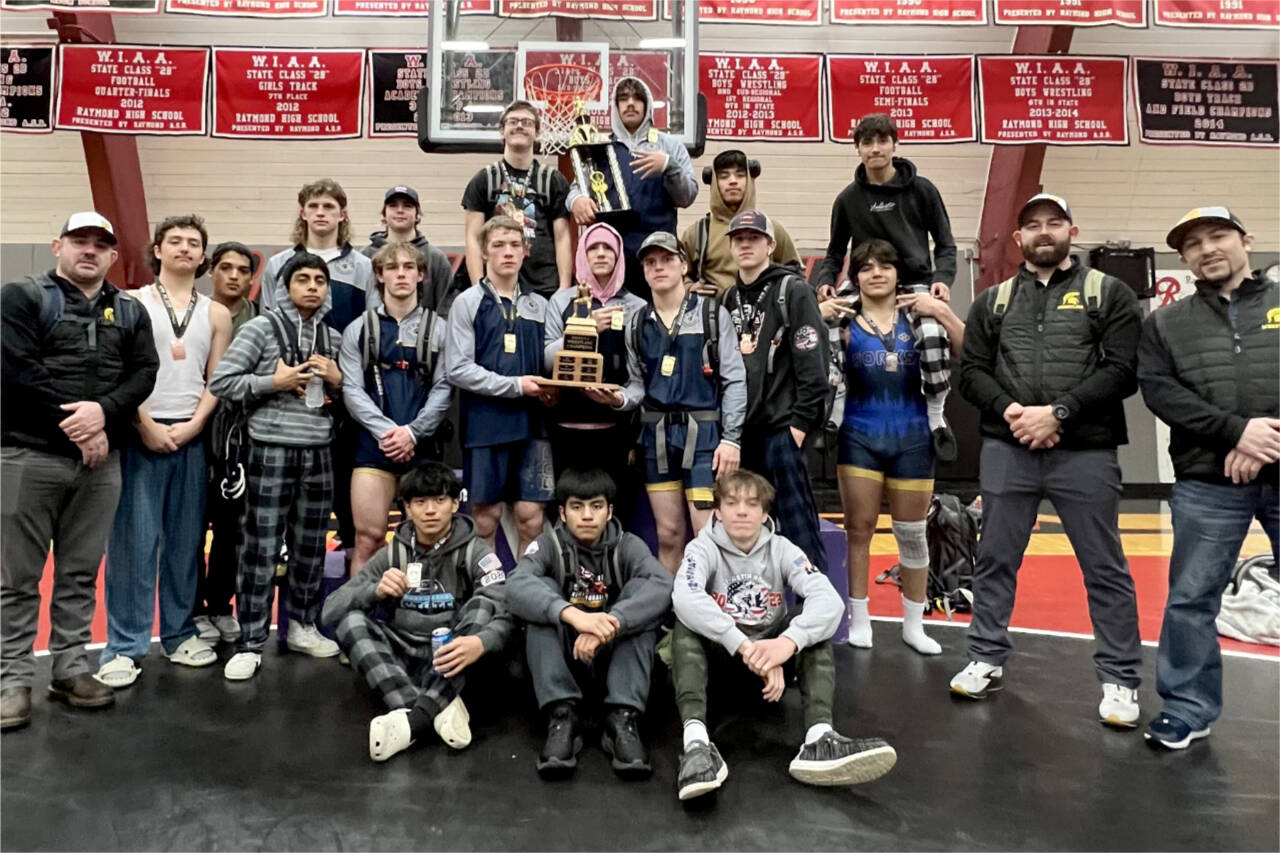 Courtesy of Forks wrestling
The Forks boys wrestling team celebrates its District 4 1B/2B subregional championship this weekend. It was the ninth meet this year the Spartans have won as a team.