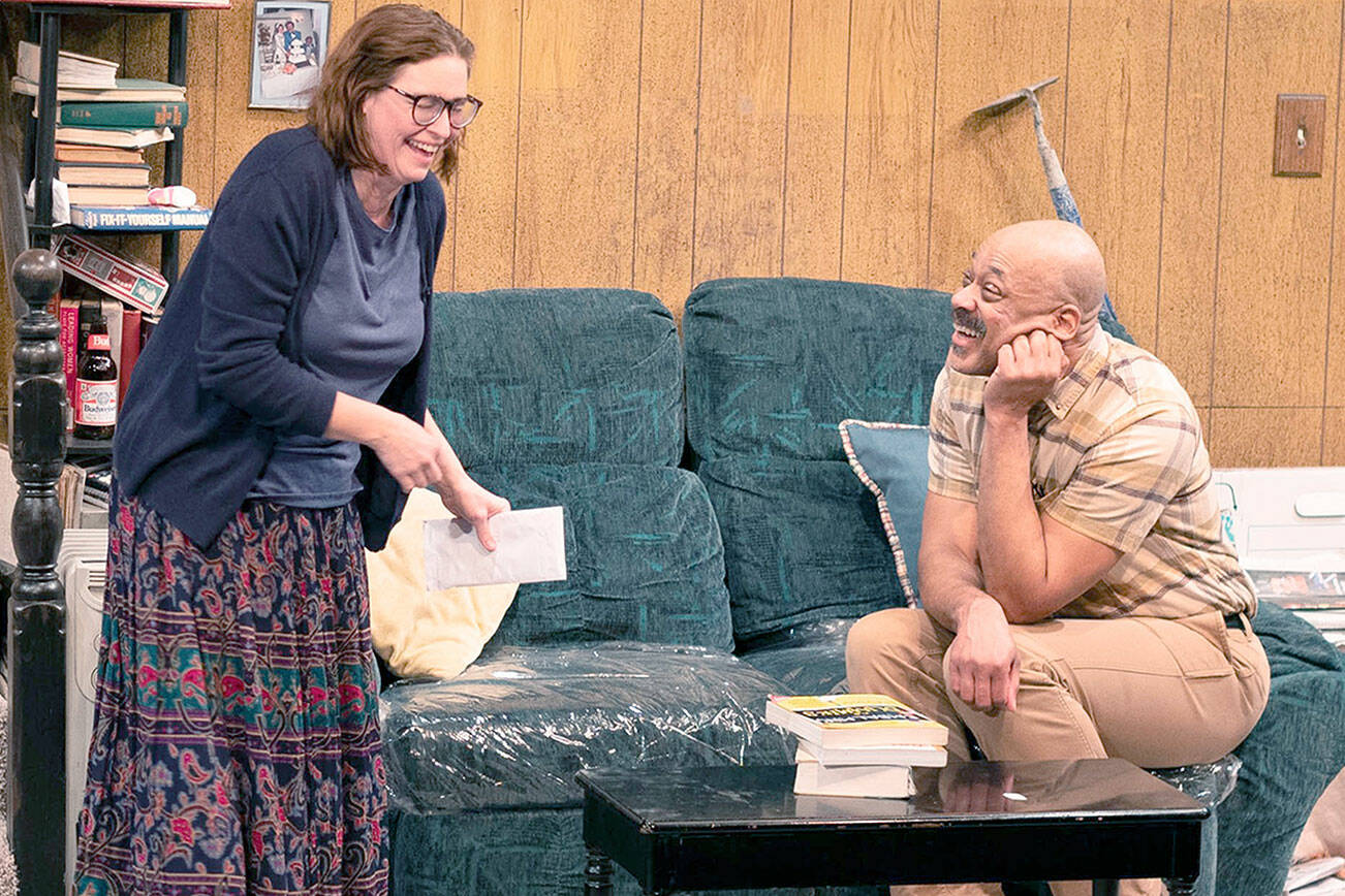 Maude Eisele (Mabel) and Brace Evans (Todd) become
acquainted in an awkward matchmaking scene in "The People Downstairs" at
Key City Public Theatre.