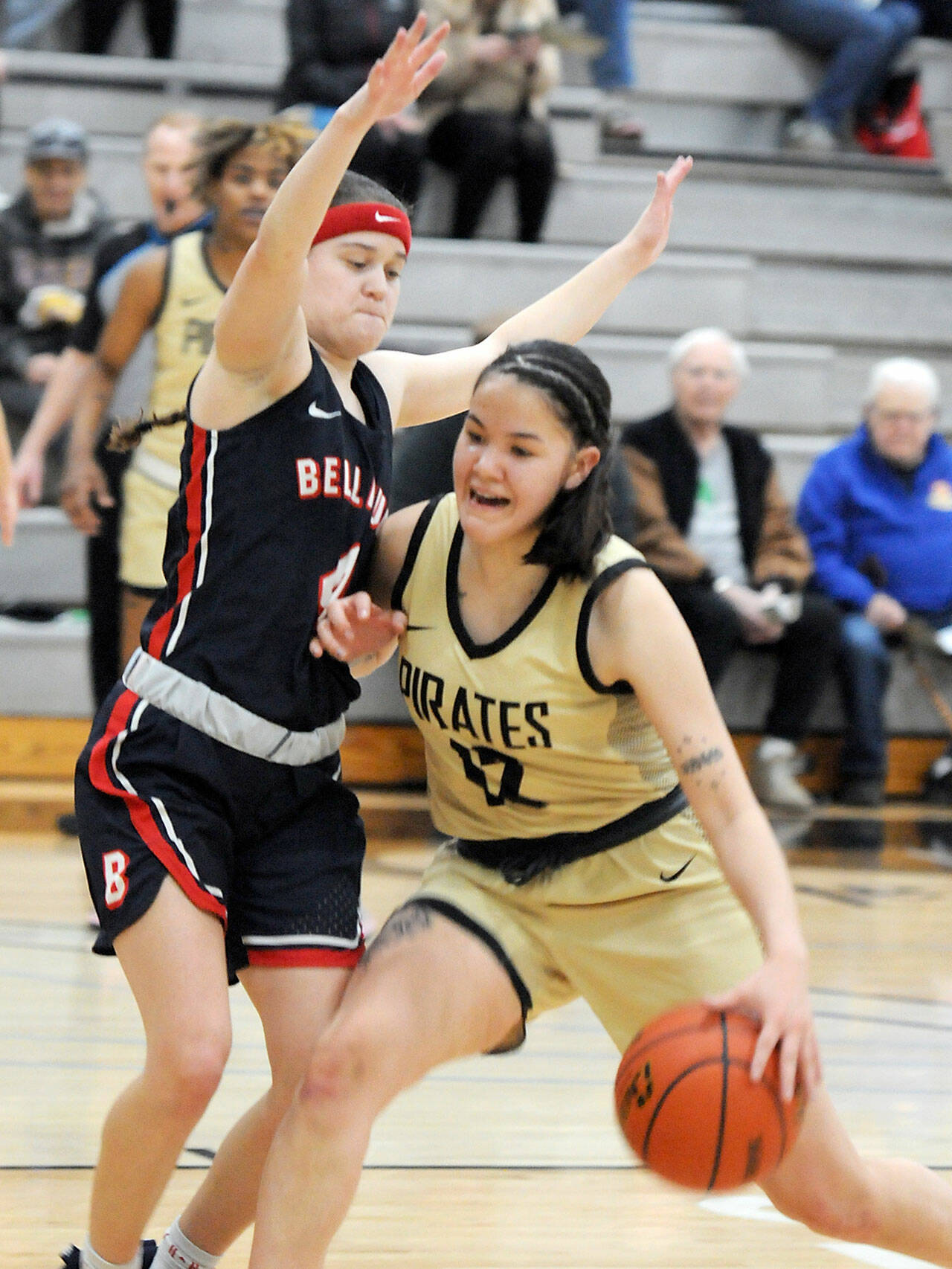 Peninsulas Adam Kaganak, right, pushes into Bellevues Sav Huerta during Wednesdays game in Port Angeles. (Keith Thorpe/Peninsula Daily News)