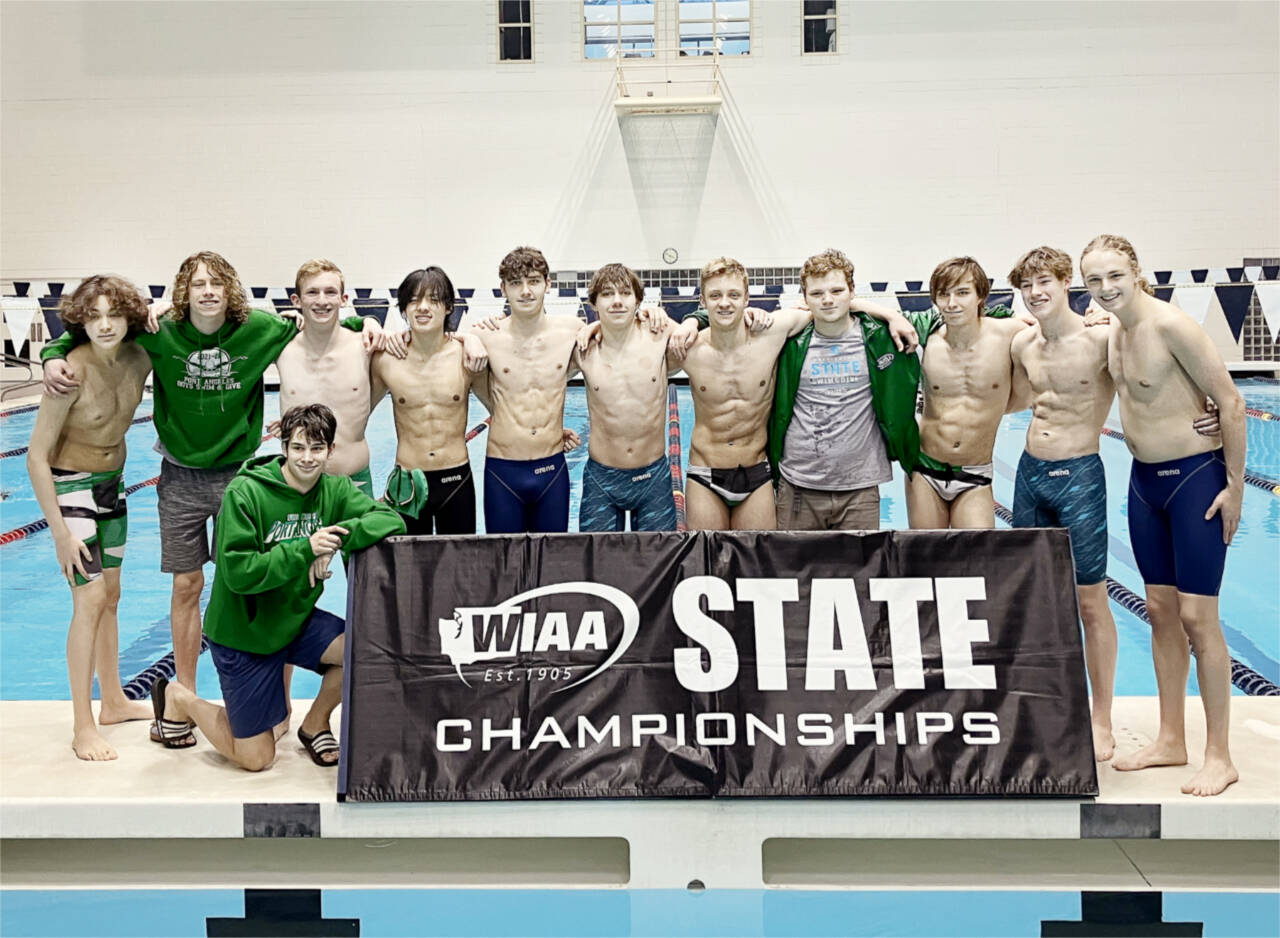The Port Angeles and Sequim boys swimming teams that competed at the state swim and dive championships in Federal Way this weekend. From left, are Nolan Medgin, Colby Ellefson (Sequim High School), Blake Nahory, Will Roening, Alex Che, Keane McClain, Landon Close, Jacob Miller, Davis Hueter, Max Baeder, Finn Thompson and Aidan Butterworth. (Courtesy photo)