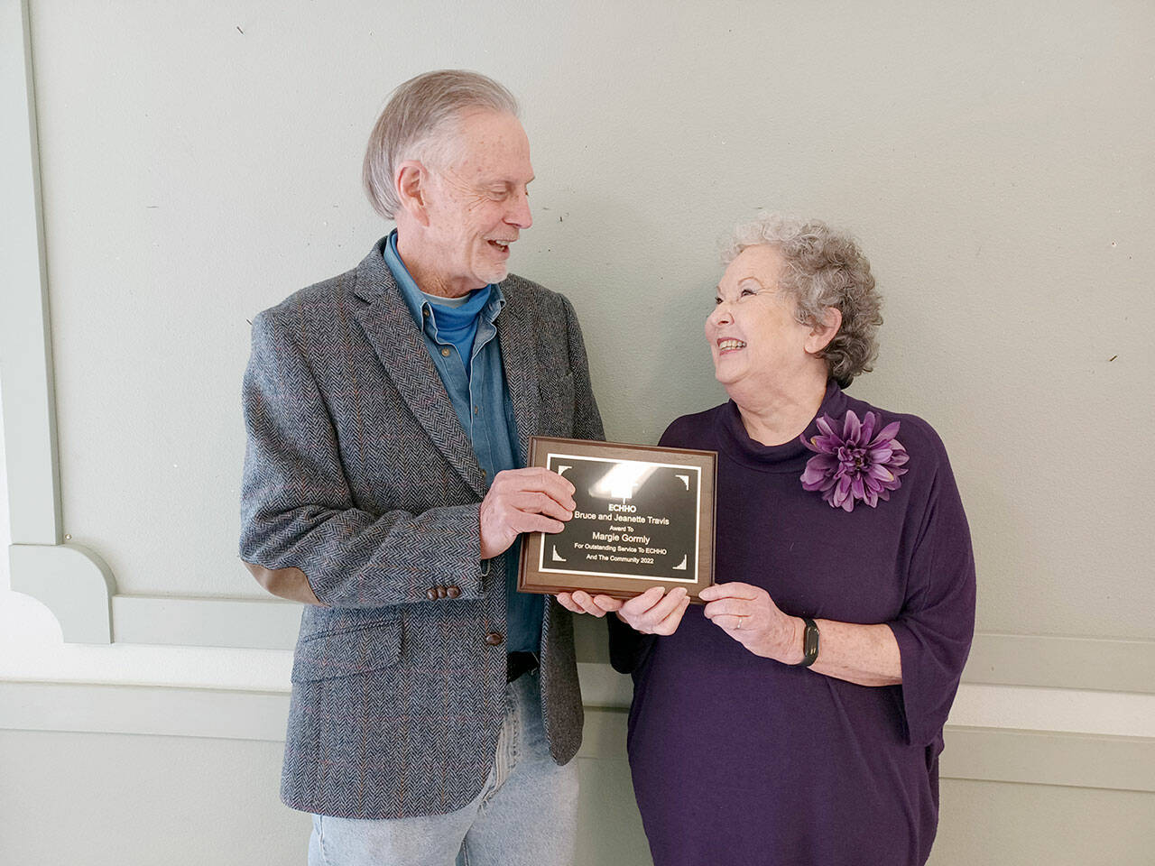 Pictured is David Whitney, ECHHO board chair, presenting the award to Gormly.