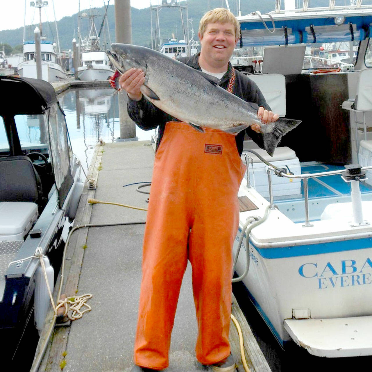 Excel Fishing Charters’ Tom Burlingame shows off a native king caught off Neah Bay during the 2022 salmon season.