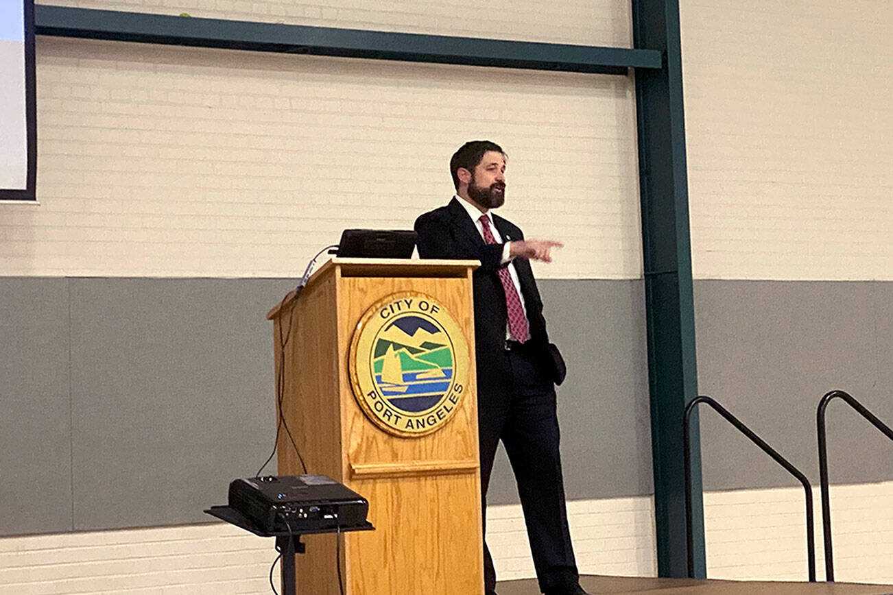 Nathan West, Port Angeles city manager, gives his annual State of the City address at a meeting of the Port Angeles Chamber of Commerce on Wednesday. (Ken Park/Peninsula Daily News)