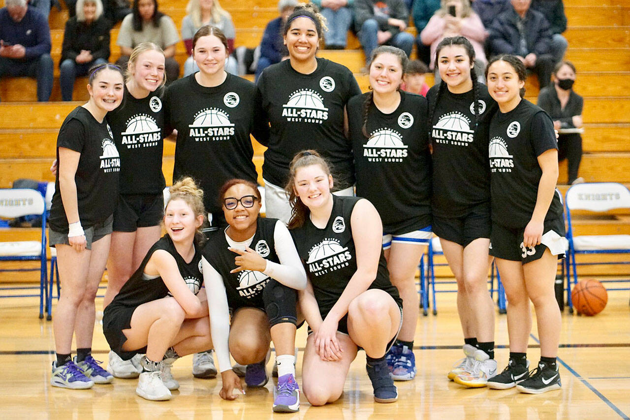 Back row from left, Sequim’s Hannah Bates, Port Angeles’ Anna Petty and Sequim’s Jelissa Julmist, back row, fourth from left, played on the Cascade team at the 21st annual West Sound Senior High School All-Star Basketball contest earlier this week at Bremerton High School.
