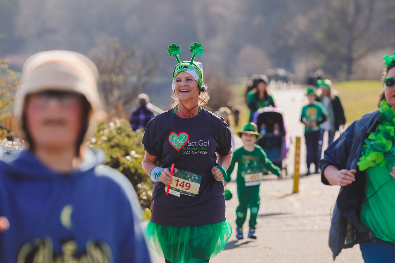 Lexi Winters photo
Dena Dinius of Port Angeles competes in the 5K of the Red, Set Go St. Patrick's Day run/walk races held in Port Angeles this weekend.