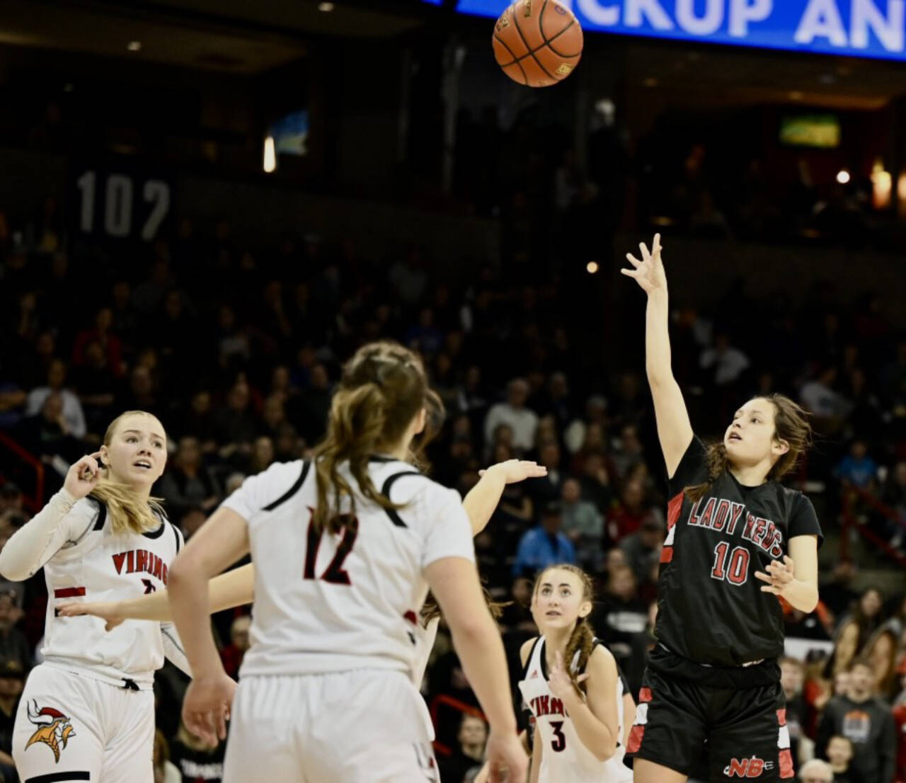 Neah Bay’s Allie Greene shoots a floater over the Mossyrock defense Saturday night in Spokane. Greene finished with 19 points, leading all scorers, in the 56-54 Neah Bay win. (Bridget Mayfield/for Peninsula Daily News)