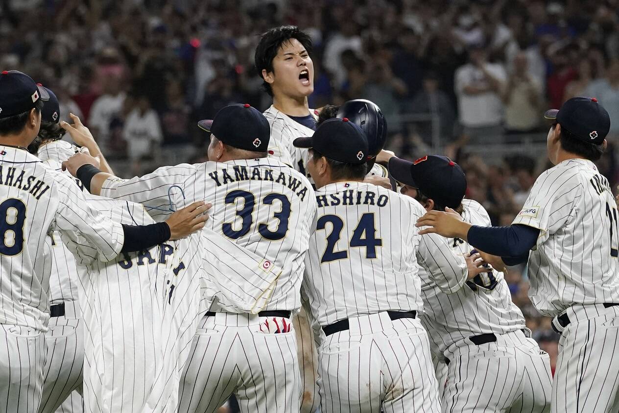 Japan pitcher Shohei Ohtani (16) celebrates after defeating the United States at the World Baseball Classic final game, Tuesday, March 21, 2023, in Miami. (AP Photo/Marta Lavandier)