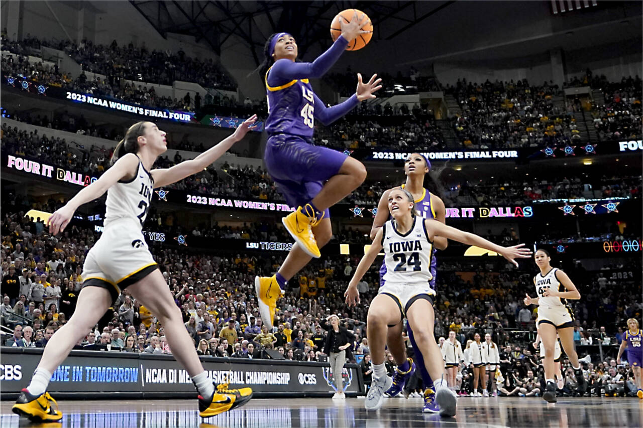 LSU’s Alexis Morris shoots past Iowa’s Caitlin Clark during the second half of the NCAA Women’s Final Four championship basketball game Sunday, April 2, 2023, in Dallas. (AP Photo/Darron Cummings)