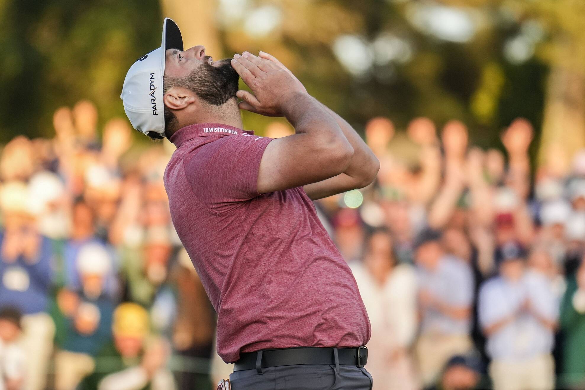 Jon Rahm, of Spain, celebrates on the 18th green after winning the Masters golf tournament at Augusta National Golf Club on Sunday, April 9, 2023, in Augusta, Ga. (AP Photo/Charlie Riedel)