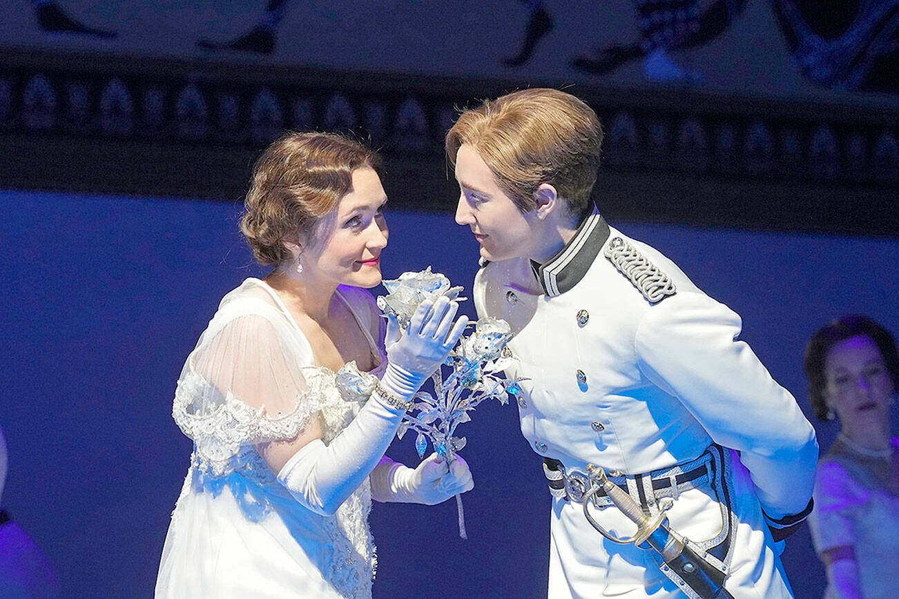 Octavian (Samantha Hankey), right, brings a silver engagement rose to Sophie (Erin Morley) in the Metropolitan Opera's "Der Rosenkavalier." The Met's performance will be simulcast in Port Angeles live from New York City this Saturday. photo by Ken Howard/Met Opera