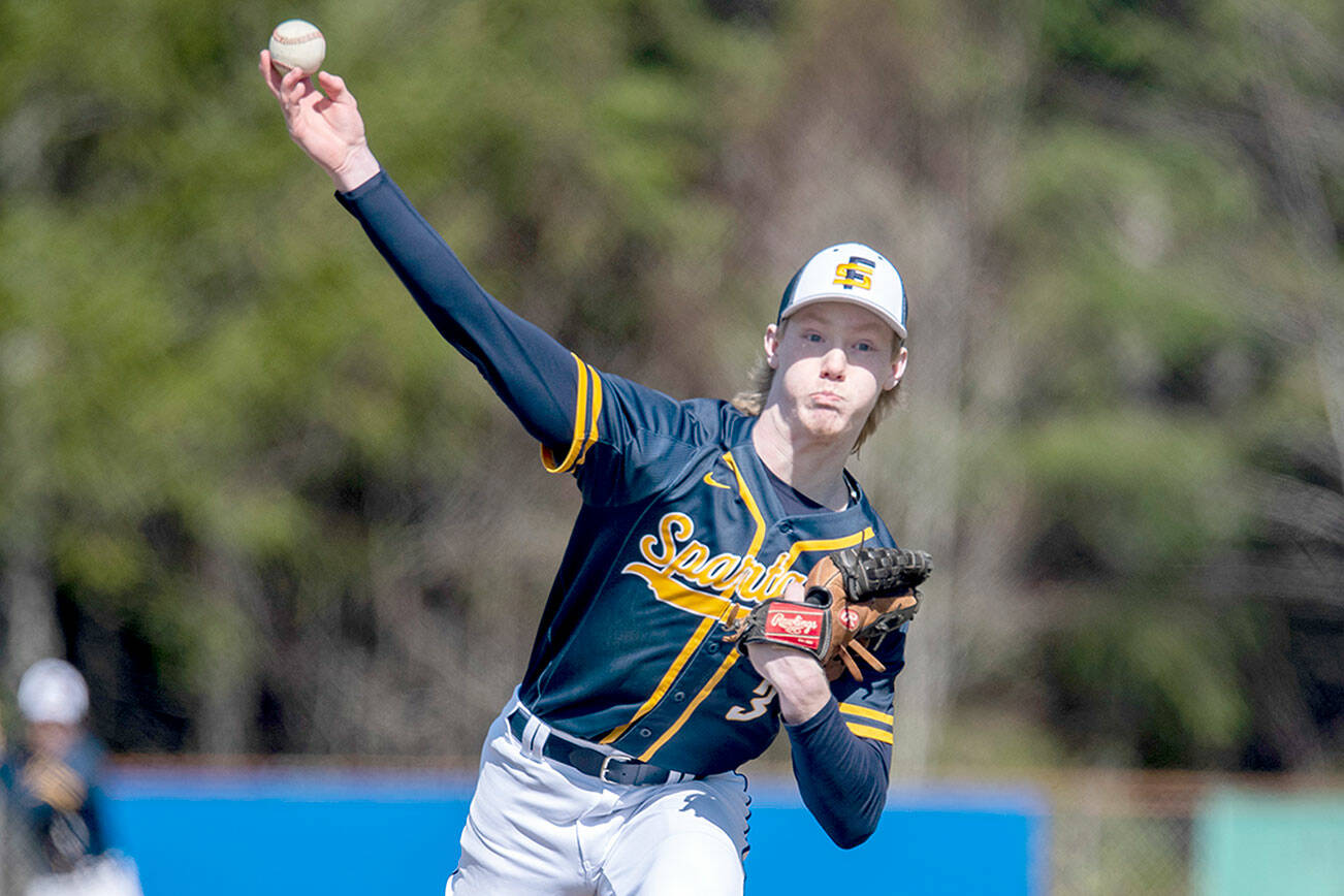 Forks’ Gunner Rogers delivers a pitch during game one of the Spartans’ doubleheader sweep of Raymond-South Bend on the road Wednesday. (Photo courtesy of Eric Trent)