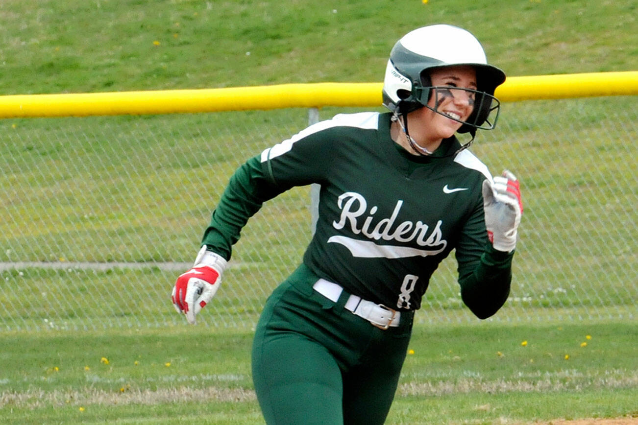 KEITH THORPE/PENINSULA DAILY NEWS
Port Angeles' Heidi Leitz rounds the bases after slugging a home run in the bottom of the first against North Mason on Saturday in Port Angeles.
