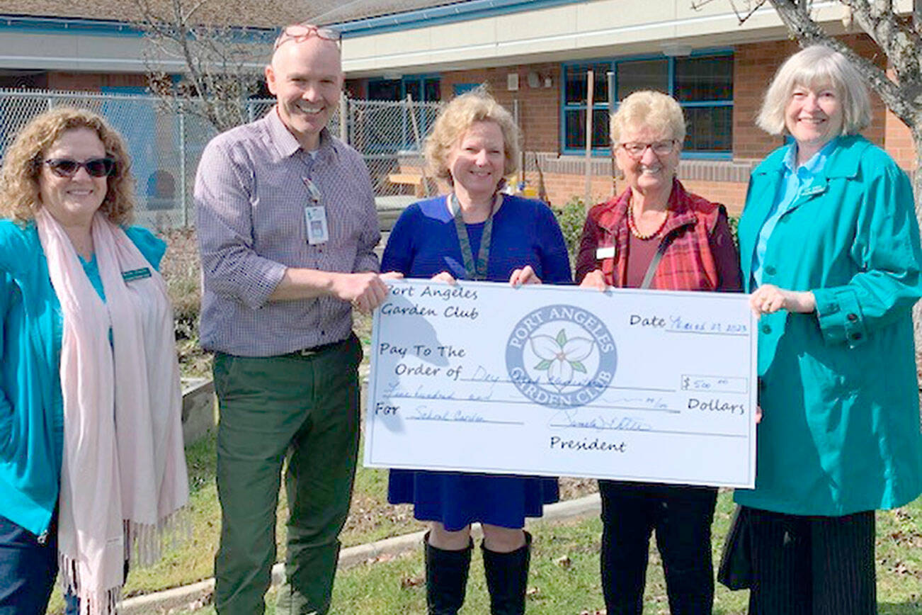 The Port Angeles Garden Club recently donated $500 to Amy Bryant, the principal at Dry Creek Elementary School, and sixth-grade teacher Anthony Seidl for a garden at the school. 

Pictured, from left to right, are Darlene Martin, Anthony Seidl, Amy Bryant, Linda Skolnik and Janet Russell.