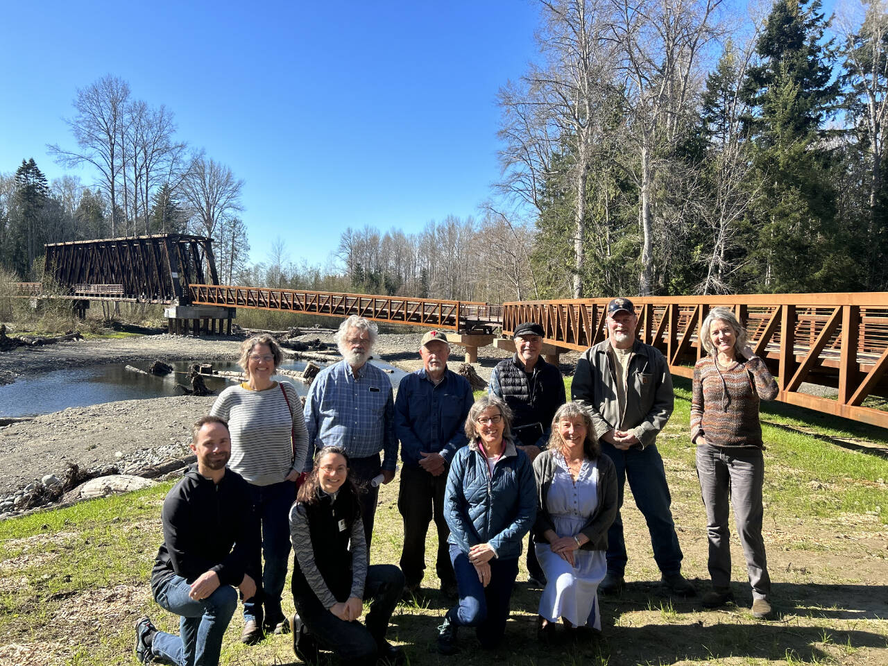 Members of the Dungeness River Management Team enjoy a day at Railroad Bridge Park. The organization was named the North Olympic Land Trust’s 2023 “Out Standing in the Field” award recipient at the Land Trust’s annual conservation breakfast on April 21. (North Olympic Land Trust)