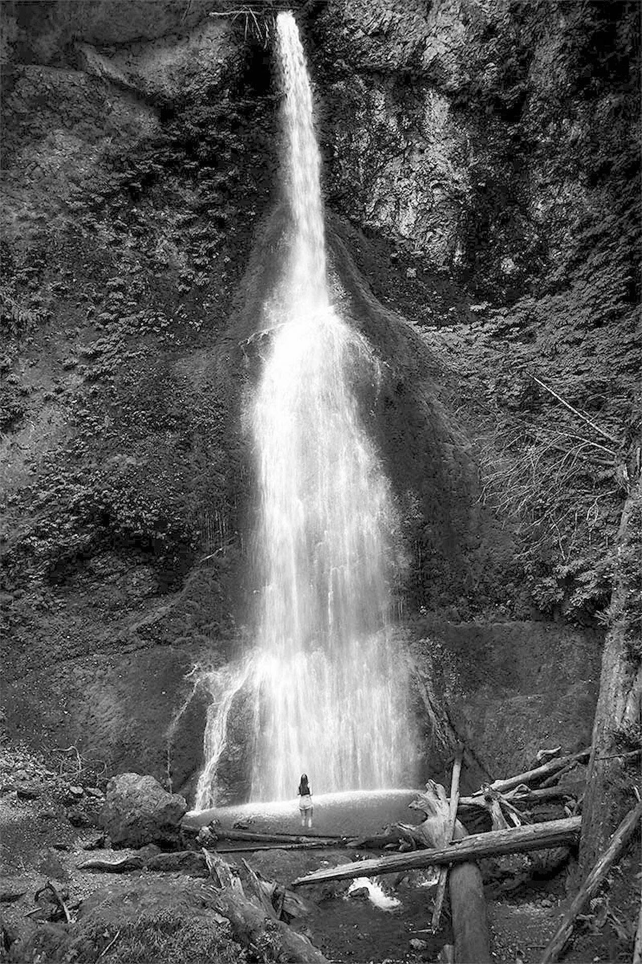 (Northwind Art Woman and Waterfall by Alisa Steck) “Woman and Waterfall,” at Marymere Falls, won Alisa Steck the Curator’s Choice Award in the “Wet” exhibition at Jeanette Best Gallery in Port Townsend. photo by Alisa Steck