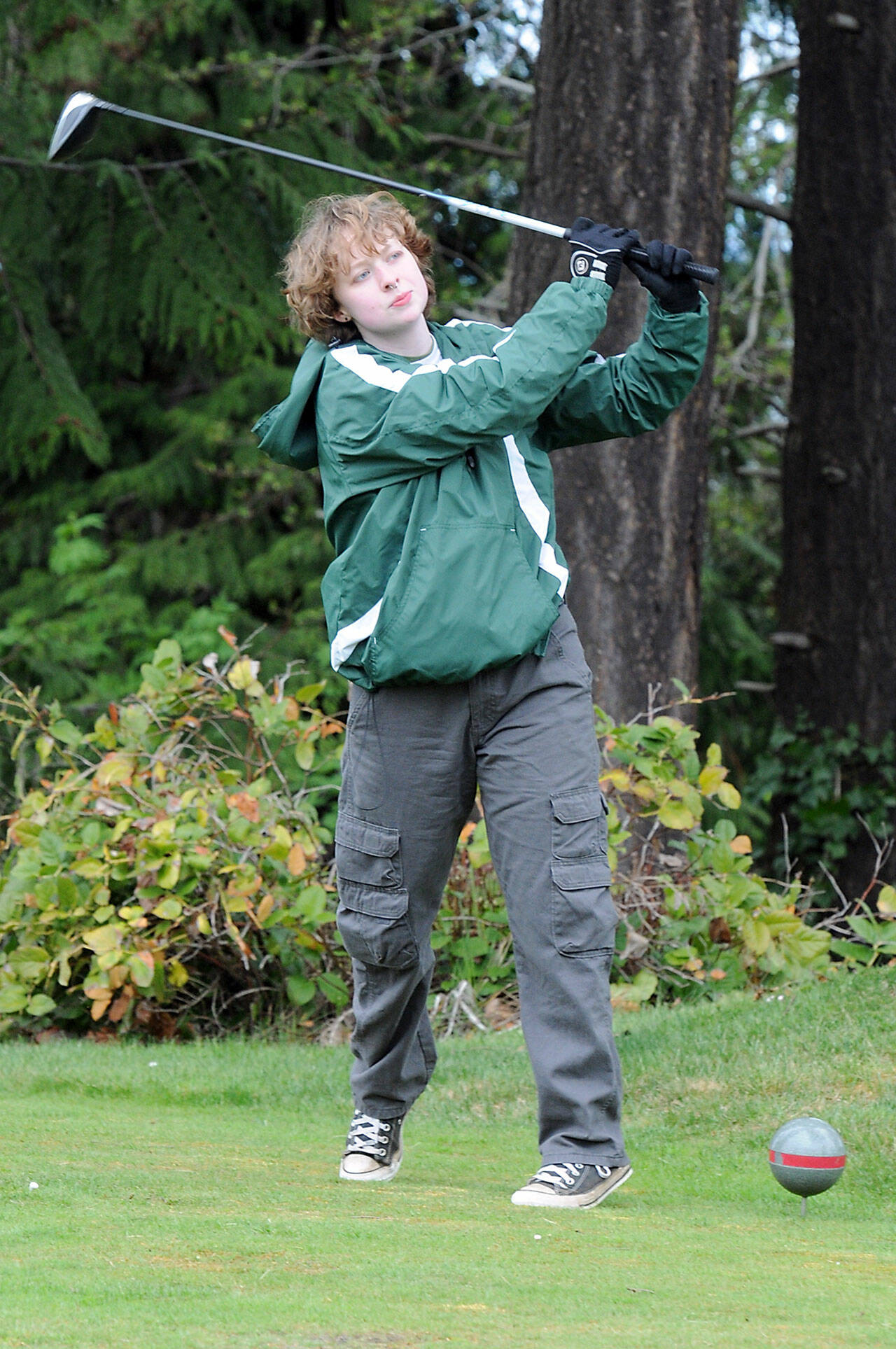 Port Angeles’ Lauryn Chapman tees off on the 16th hole during the Duke Streeter Memorial Invitational Tournament. on Tuesday at Peninsula Golf Club. (Keith Thorpe/Peninsula Daily News)
Port Angeles’ Lauryn Chapman tees off on the 16th hole during the Duke Streeter Memorial Invitational Tournament. on Tuesday at Peninsula Golf Club. (Keith Thorpe/Peninsula Daily News)