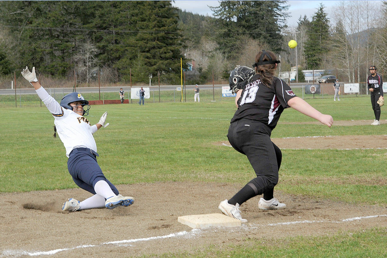 Lonnie Archibald/for Peninsula Daily News
Forks' Elizabeth Soto steals third during the first game of a double header at the Fred Orr Memorial Park in Beaver with Pacific League opponent Ocosta.