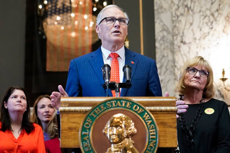 Washington Gov. Jay Inslee speaks before signing multiple bills meant to prevent gun violence on April 25, 2023, at the Capitol in Olympia. On Monday, Inslee announced he does not plan to seek a fourth term. He was most recently re-elected in 2020, making him only the second Washington state governor to serve three consecutive terms. (Lindsey Wasson/The Associated Press, file)
