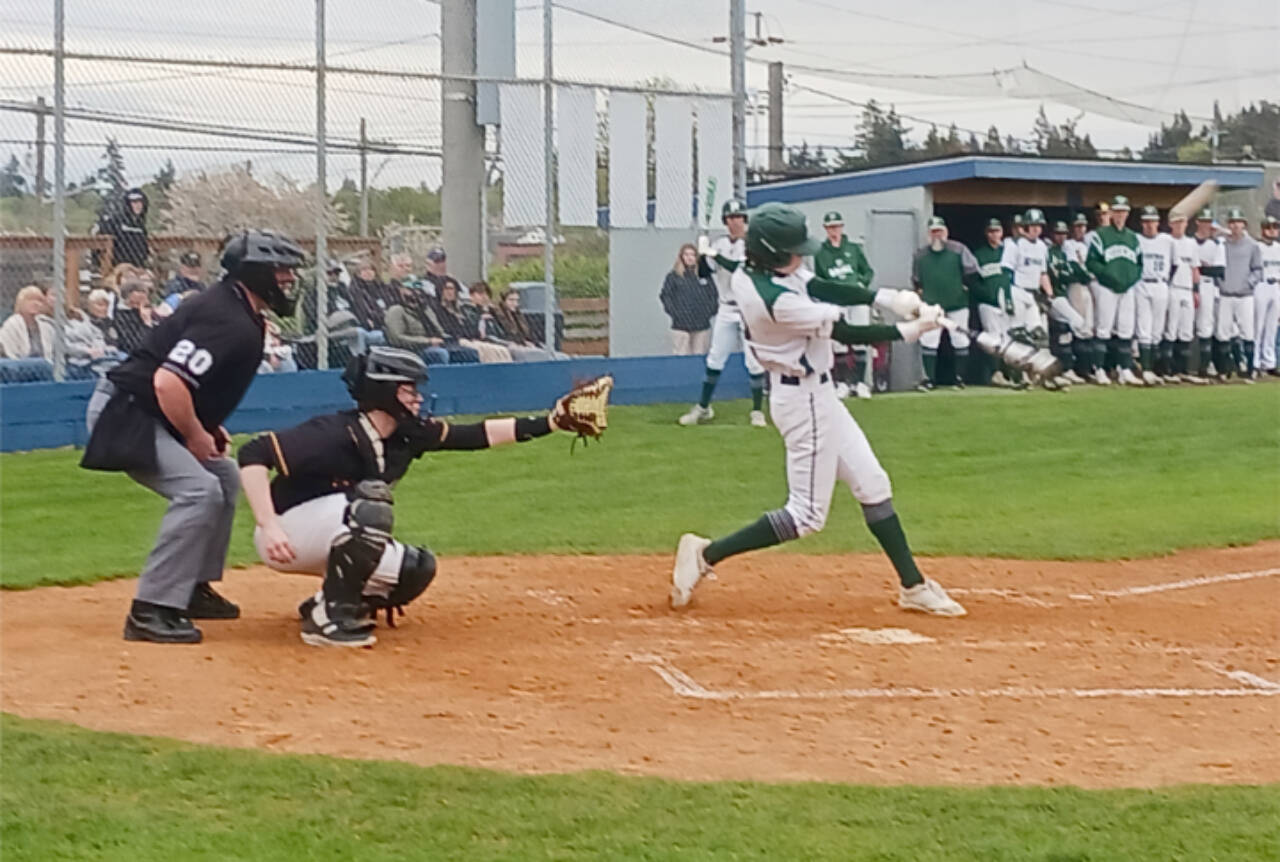 Port Angeles' Alex Angevine bats against Kingston on Monday. In the same at-bat, he hit a deep RBI triple. (Pierre LaBossiere/Peninsula Daily News)