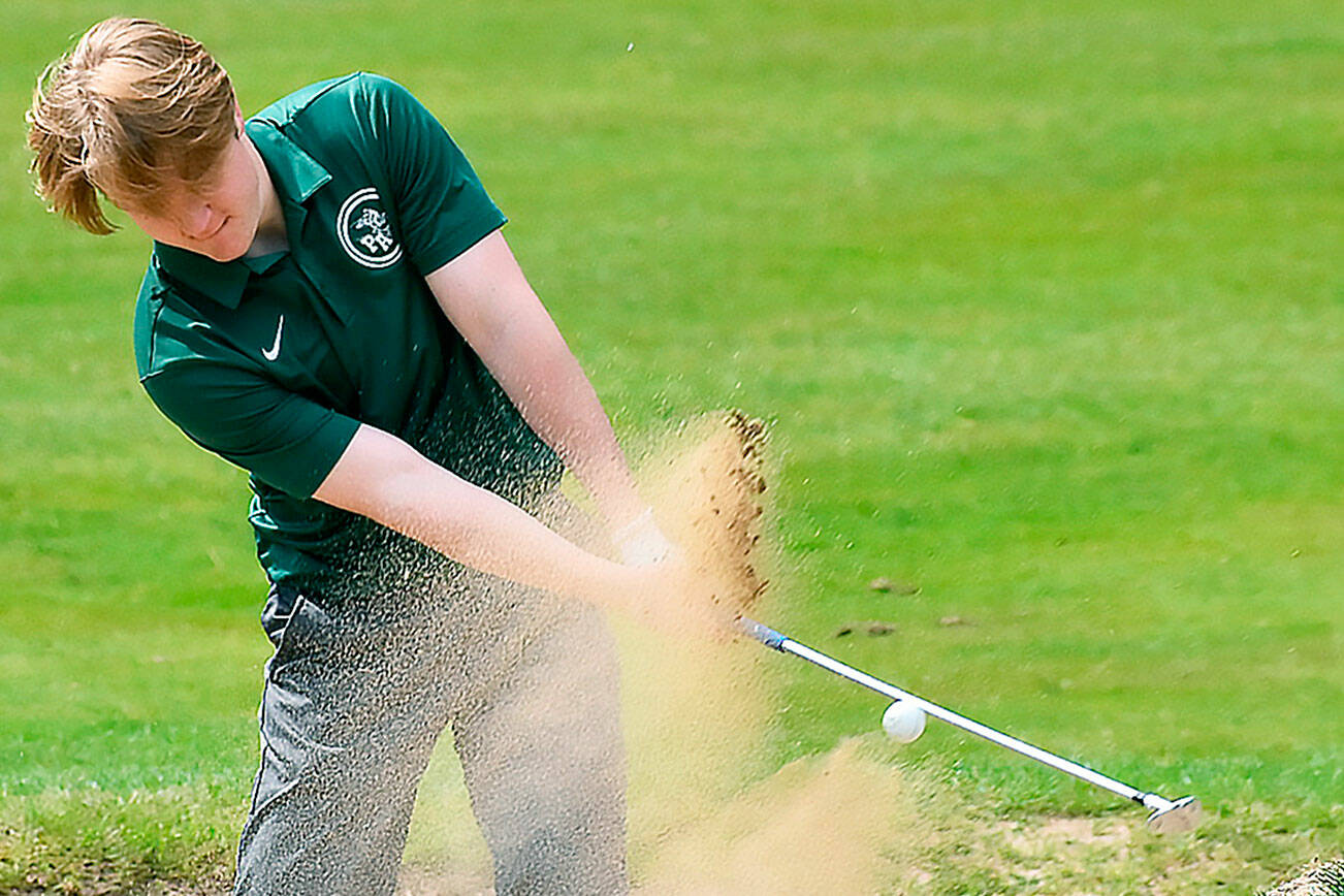 Nicholas Zeller-Singh/Kitsap News Group
Port Angeles senior Edun Bailey escapes a sand trap during the Olympic League Golf Championships at Kitsap Golf & Country Club on Monday. Bailey finished tied for sixth and qualified for the state tournament in Spokane.