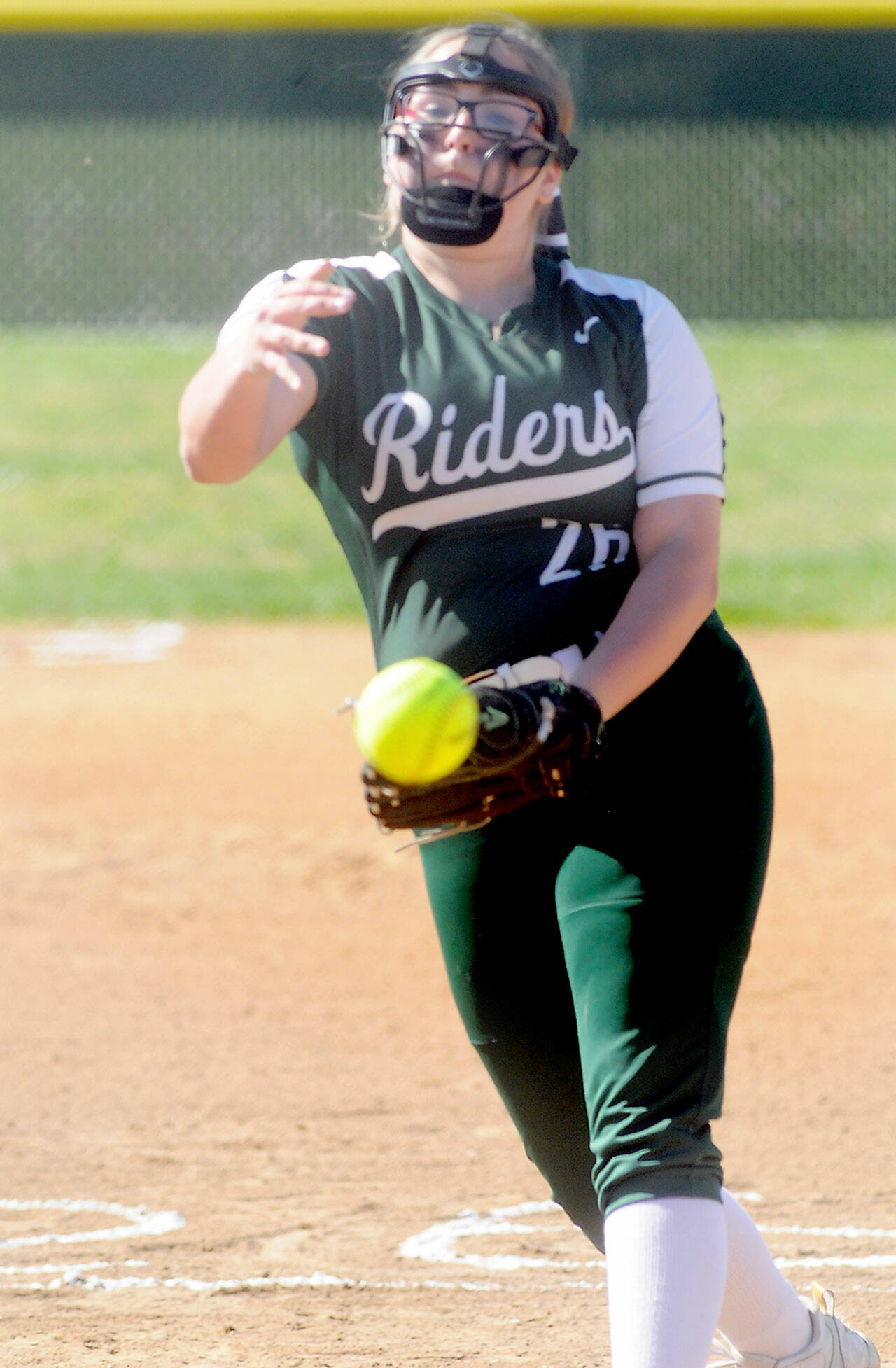 Port Angeles pitcher Cheyenne Zimmer throws in the first inning against Sequim on Friday afternoon in Port Angeles. She struck out 10 in an 8-1 victory. (Keith Thorpe/Peninsula Daily News)