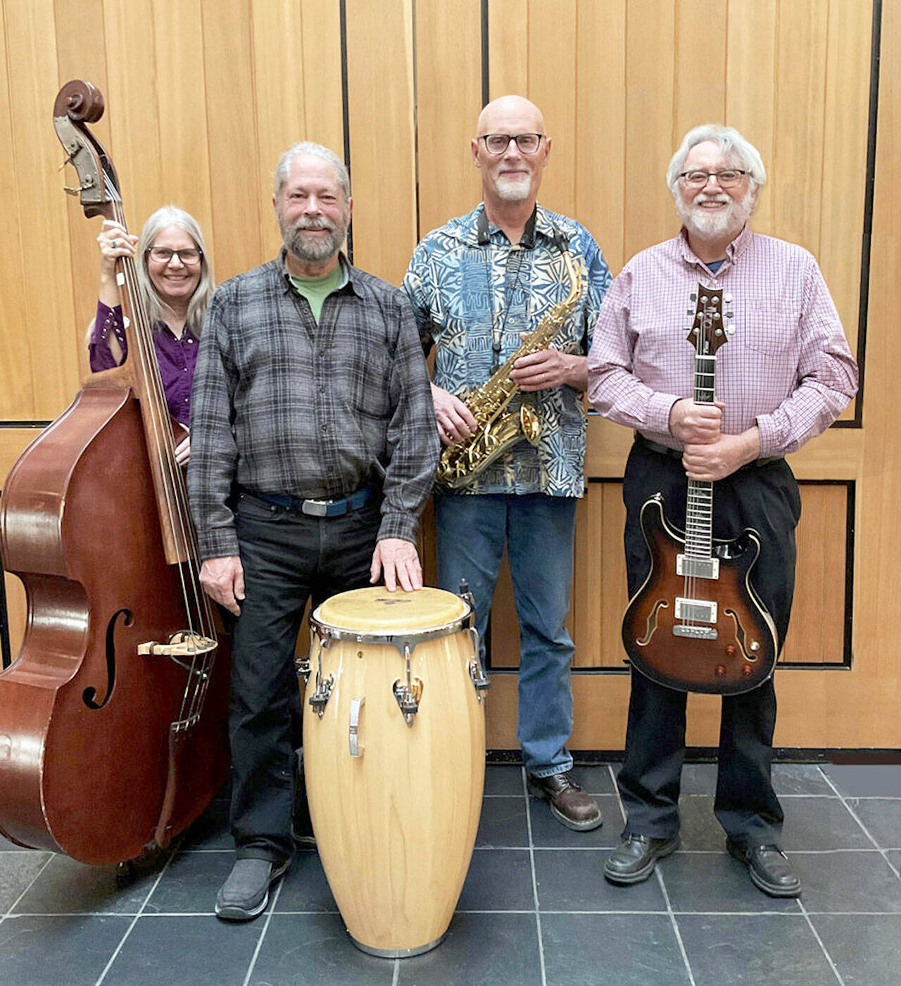 The band Port Town Zen — from left, Tracy Grisman, Barrett Wilson, Cam McMinn and “Busker Scott” Braman — will fill the Northwind Art School’s open studio with jazz and swing this Monday evening. (photo courtesy of Port Town Zen)
