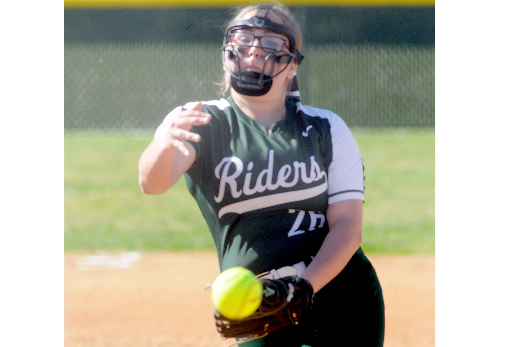 Port Angeles pitcher Cheyenne Zimmer throws in the first inning against Sequim on Friday afternoon in Port Angeles. (Keith Thorpe/Peninsula Daily News)