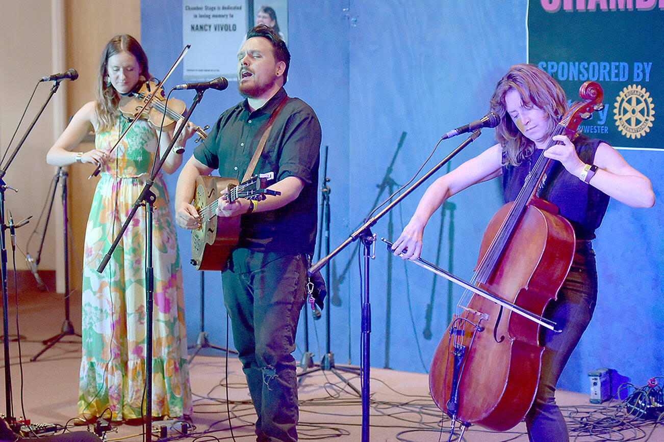 Sam Chase, center, performs with The Sam Chase Trio, Chandra Johnson, left, and Devon McClive, on Saturday at the Chamber Stage of the Juan de Fuca Festival. (Keith Thorpe/Peninsula Daily News)