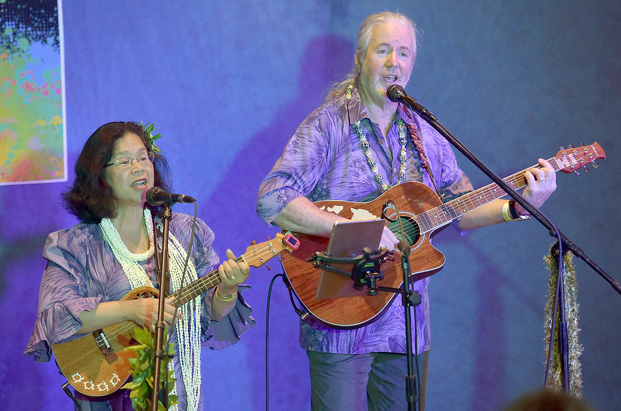 Bremerton-based Rozz and Jim Lowry perform Hawaiian-influenced music as Makani E on Saturday at the Juan de Fuca Festival in Port Angeles. (Keith Thorpe/Peninsula Daily News)